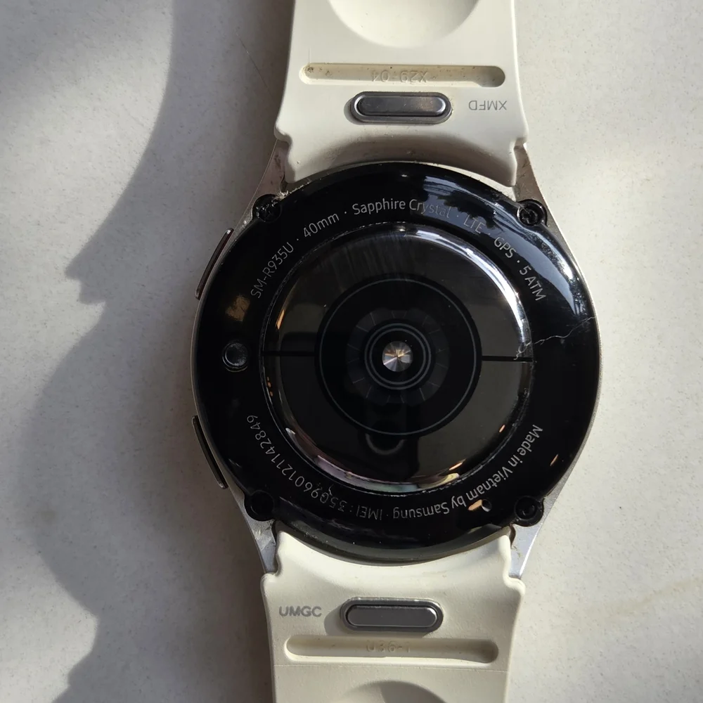 Versatile White Smartwatch with Multiple Bands